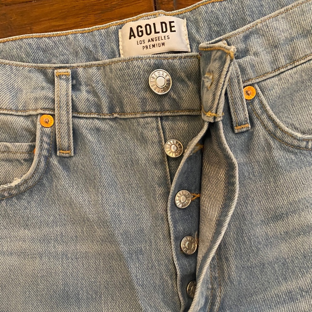 High waist AGOLDE distressed denim.
